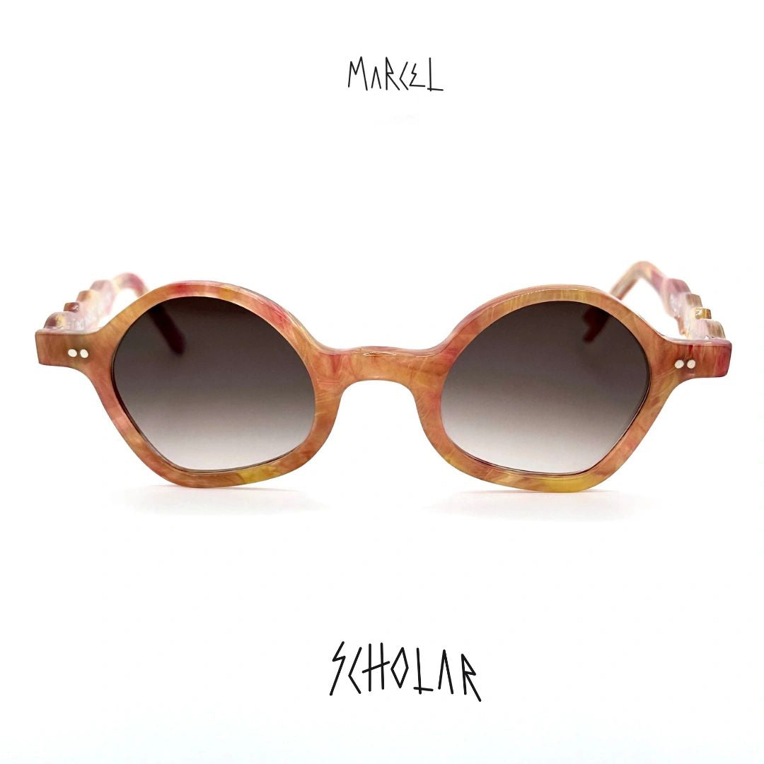 Sunglasses with tortoiseshell frame and gradient lenses on a white background, featuring the brand 'Marcel'. Front view.