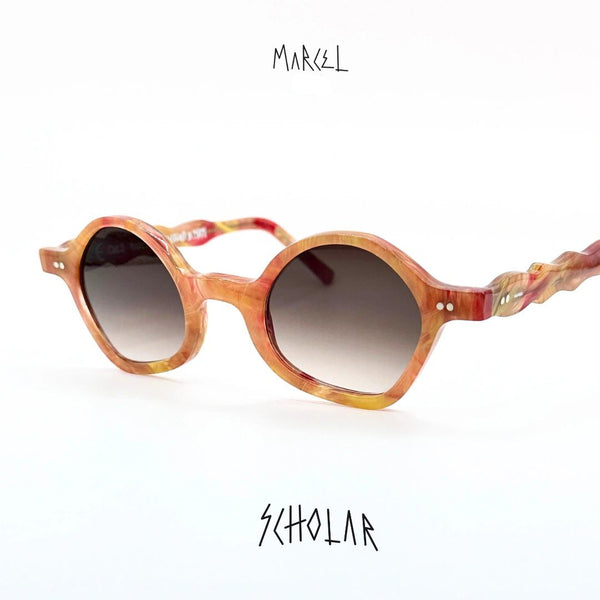 Sunglasses with a marbled design on a white background, featuring the brand 'Marcel'. 3/4 front view.