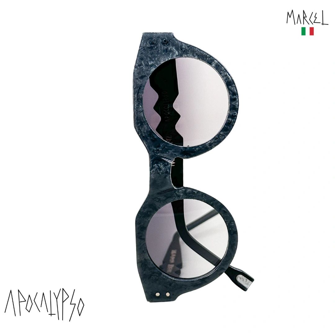 Sunglasses with reflective lenses on a white background, featuring the brand 'Marcel'. Front view.