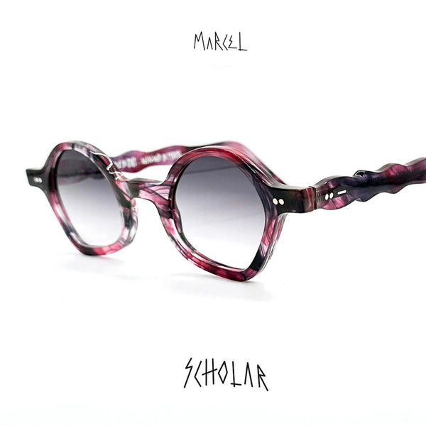 Marcel sunglasses with pink and purple frame on a white background. 3/4 front view.