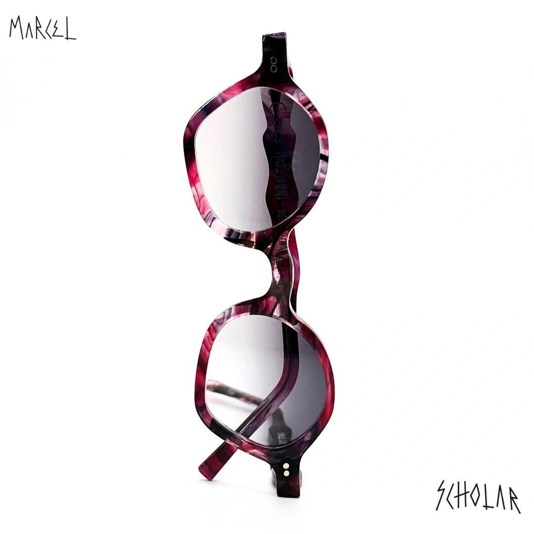 Marcel scholar eyeglasses with purple tortoiseshell frame on a white background