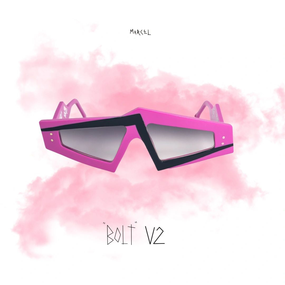 Pink sunglasses with black lenses on a pink watercolor background, featuring the brand 'Marcel'. Front view.